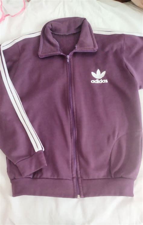 blusa de frio da adidas roxa falsa